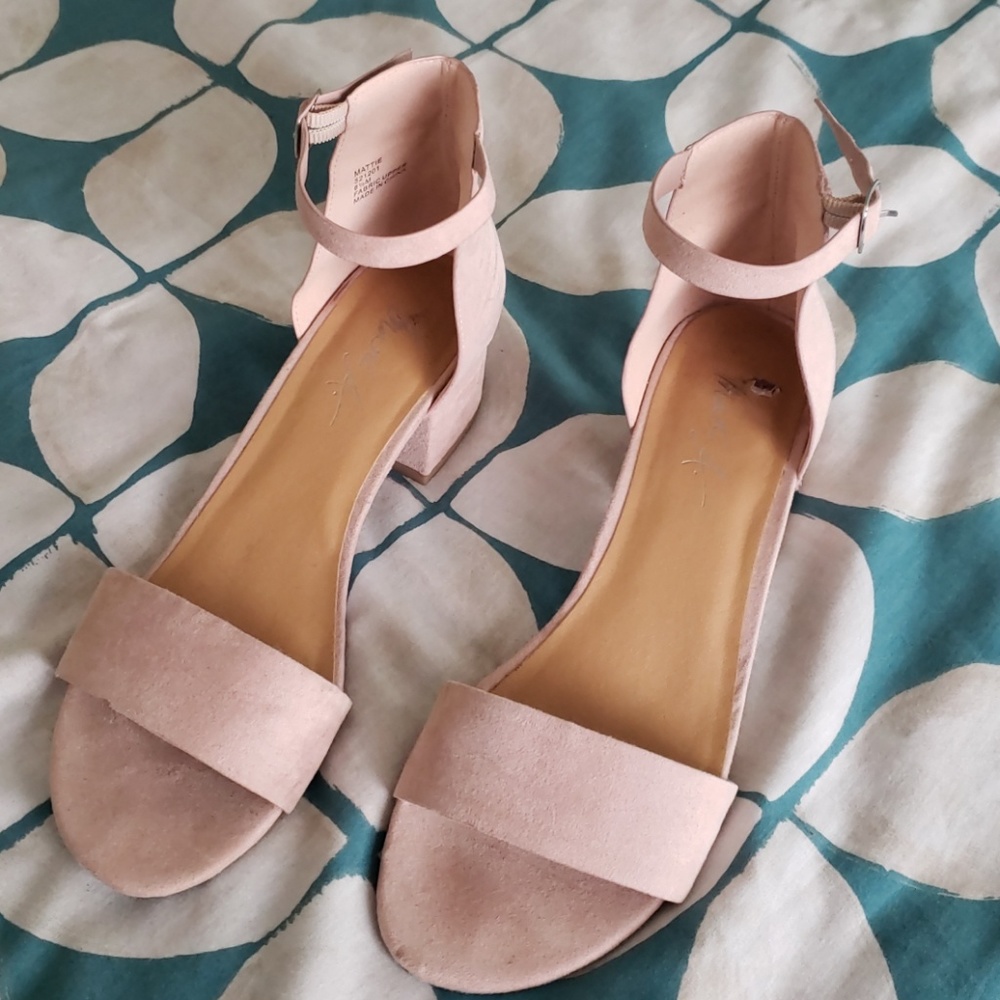 Cute baby pink open toe heeled sandals.